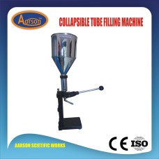 COLLAPSIBLE TUBE FILLING MACHINE